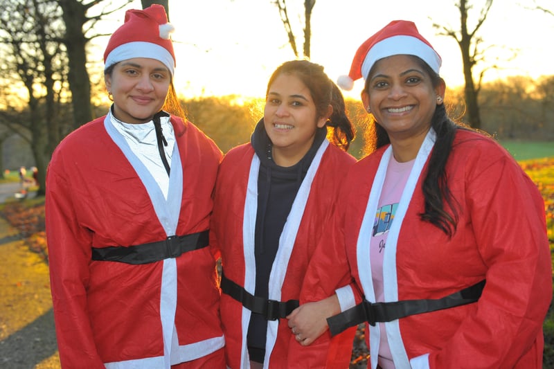 Three ladies in santa suits